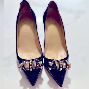 Christian Louboutin, black 65 pump, size 5.
